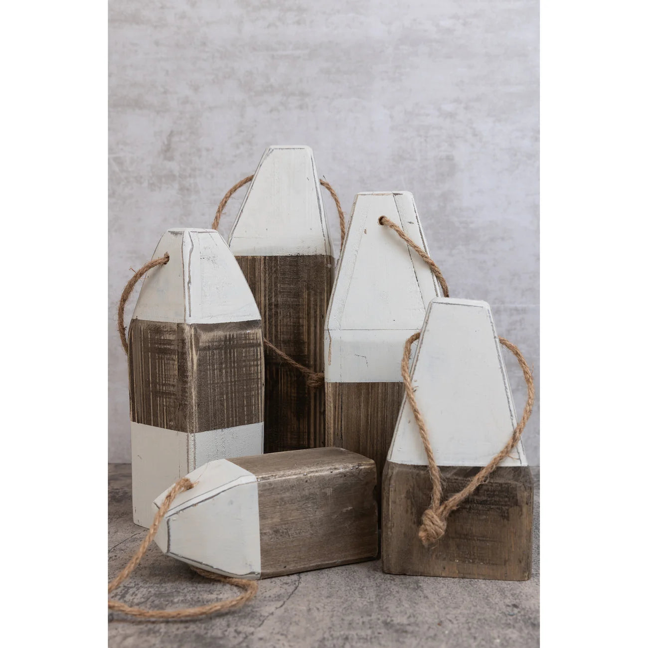 Gray and White Wooden Buoys